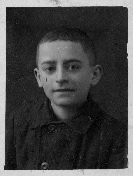 Age 12, during the occupation in 1942. During this time, his school was closed, so Blank studied at home with his own books. After the occupation, he was able to return to school and advance as a result of studies that he had completed on his own.