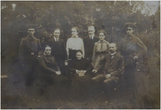 The Moses Family before the Holocaust: Terry’s parents, aunts and uncles, grandparents and great-grandmother. Terry’s father is far right, in his World War I uniform. Her mother, Claire (Klara) is wearing white.