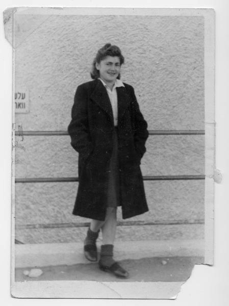 Zina Gontownik wearing a new coat during her stay at a Displaced Persons camp in Feldafing, Germany, after the war