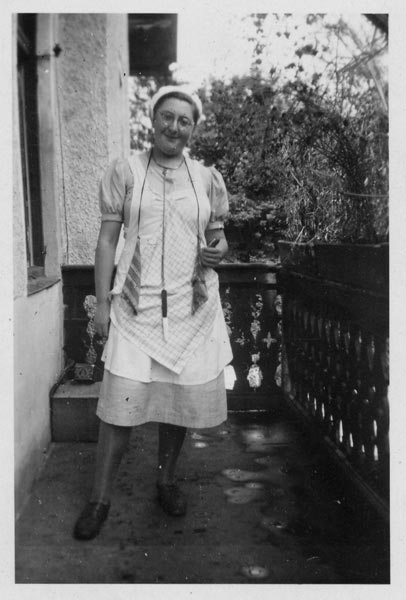 Hanna Hamburger, age 16, dressed for a cooking lesson while at boarding school in Bavaria. The school was strictly for Jewish girls, and they were taught cooking, sewing, cleaning, and languages, including Hebrew, Spanish, French, and English. Hamburger was unable to go to the regular German school because she was Jewish.