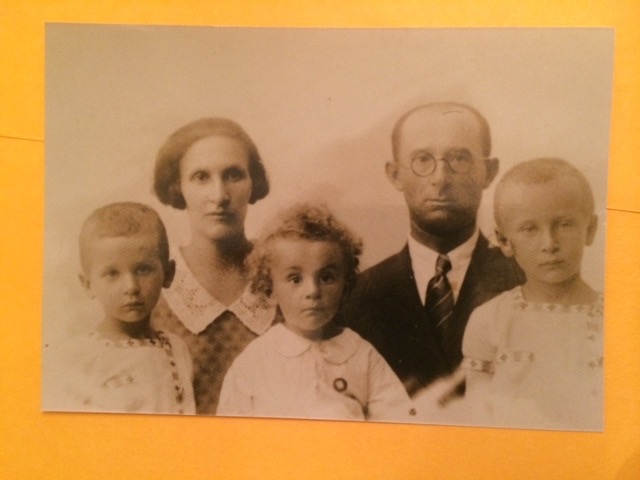 Kaplan family portrait taken in Lithuania of Herman’s parents, Chaya Libbye and David Kaplan, with children Abe, Isaac, and Herman, far right.