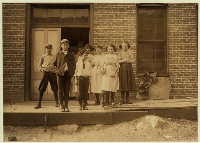 Workers at May Hosiery Mills, 1910. The youngest boy is ten years old, and had been working nine months when the photo was taken. Library of Congress Prints and Photographs, Lewis Wickes Hines, Photographer.