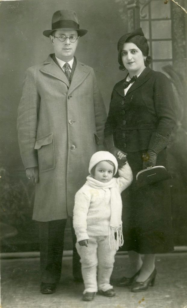 Freda Beckin with her parents.